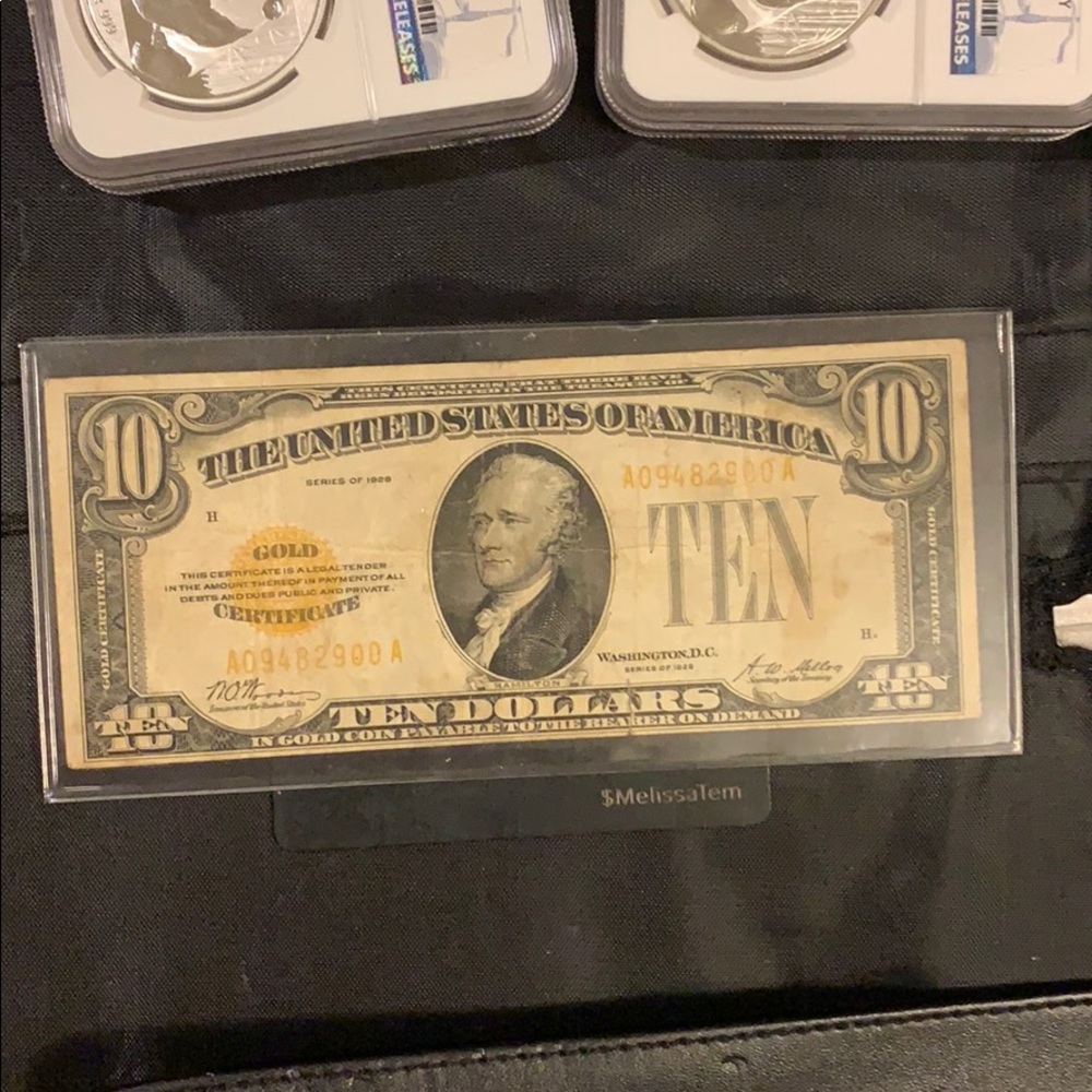 1928 gold $10 certificate very nice condition.